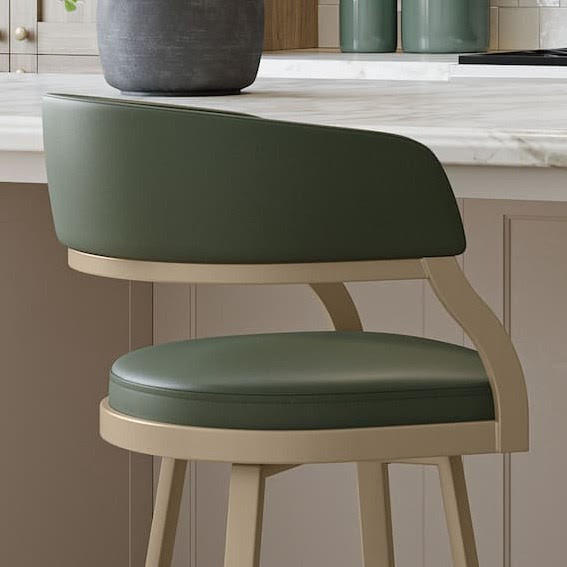 Curved counter stool in muted green and beige – sculptural seating trend 2026.